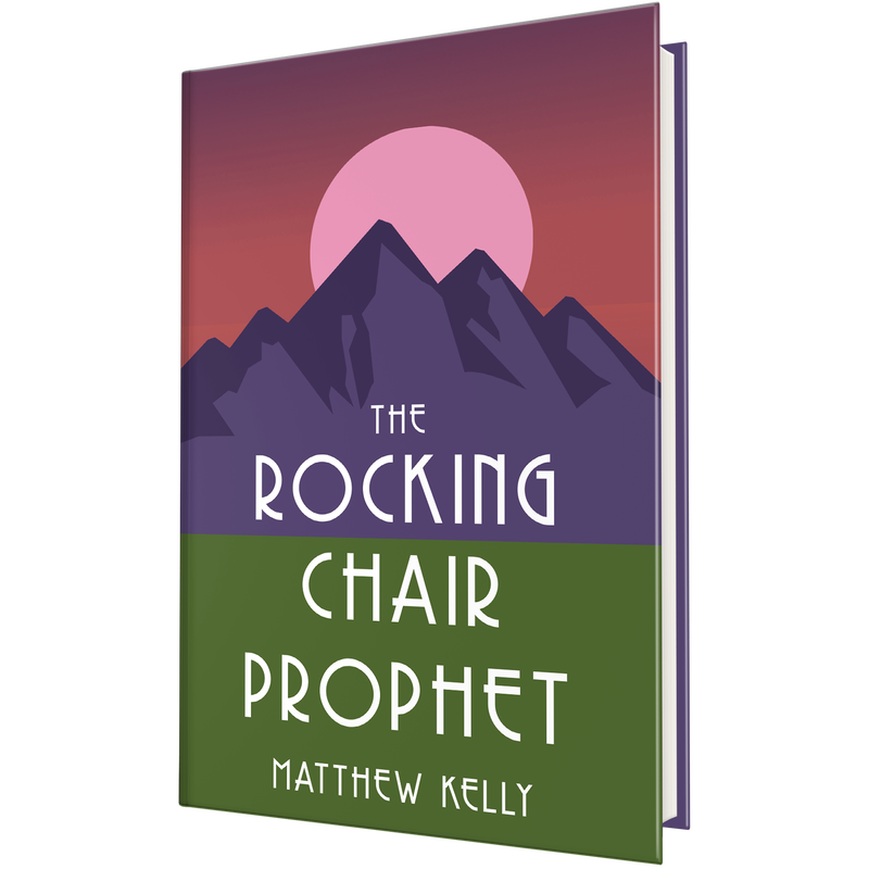 Book titled The Rocking Chair Prophet featuring an illustration of mountains with a pink sun in the background and a green foreground. image number 0